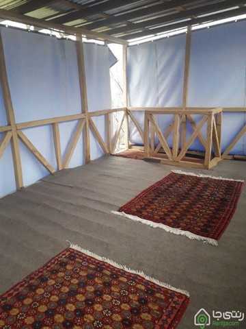 کلبه چوبی در بابل